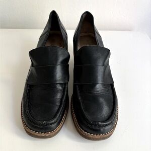 Black leather loafers